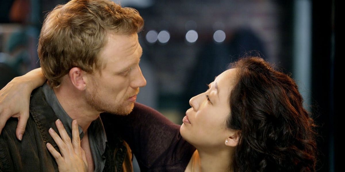 Cristina and Owen staring at each other on Grey's Anatomy