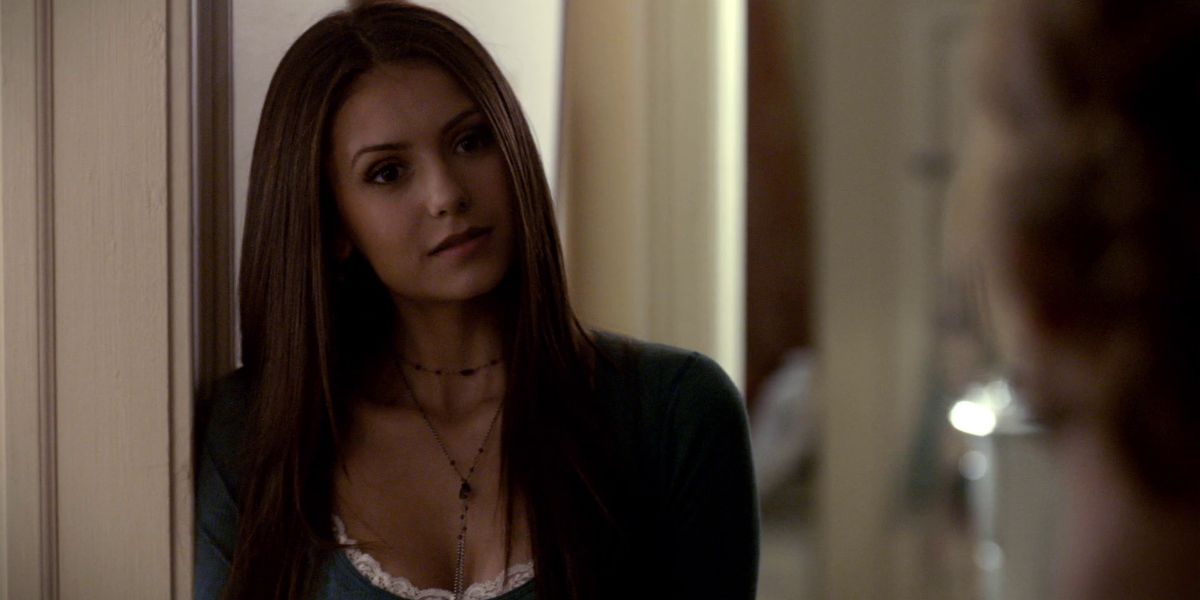 Elena leaning against the doorframe in The Vampire Diaries