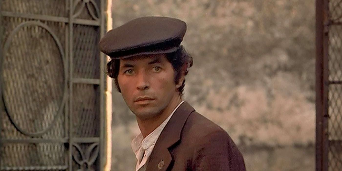 Fabrizio looking at someone off camera in The Godfather.