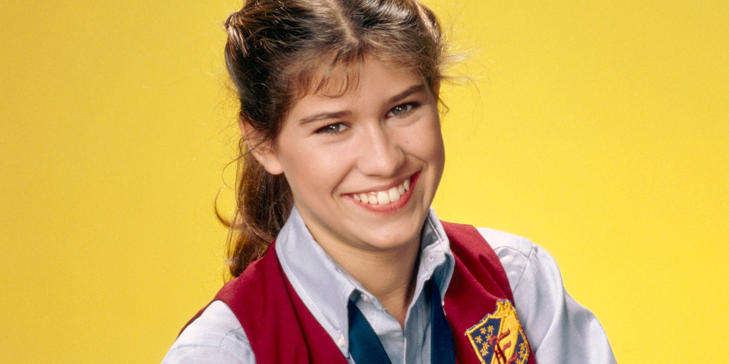 Nancy McKeon smiles at the camera in The Facts of Life
