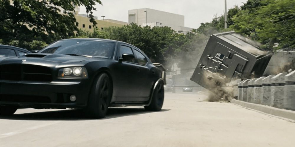 Two cars dragging a safe in Fast Five