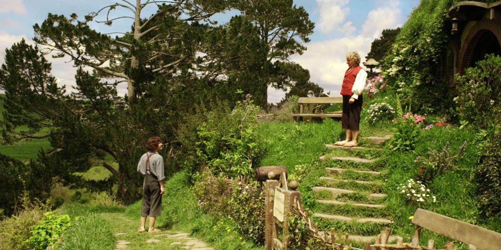 Frodo and Bilbo outside of Bag End in Lord of the Rings: The Fellowship of the Ring