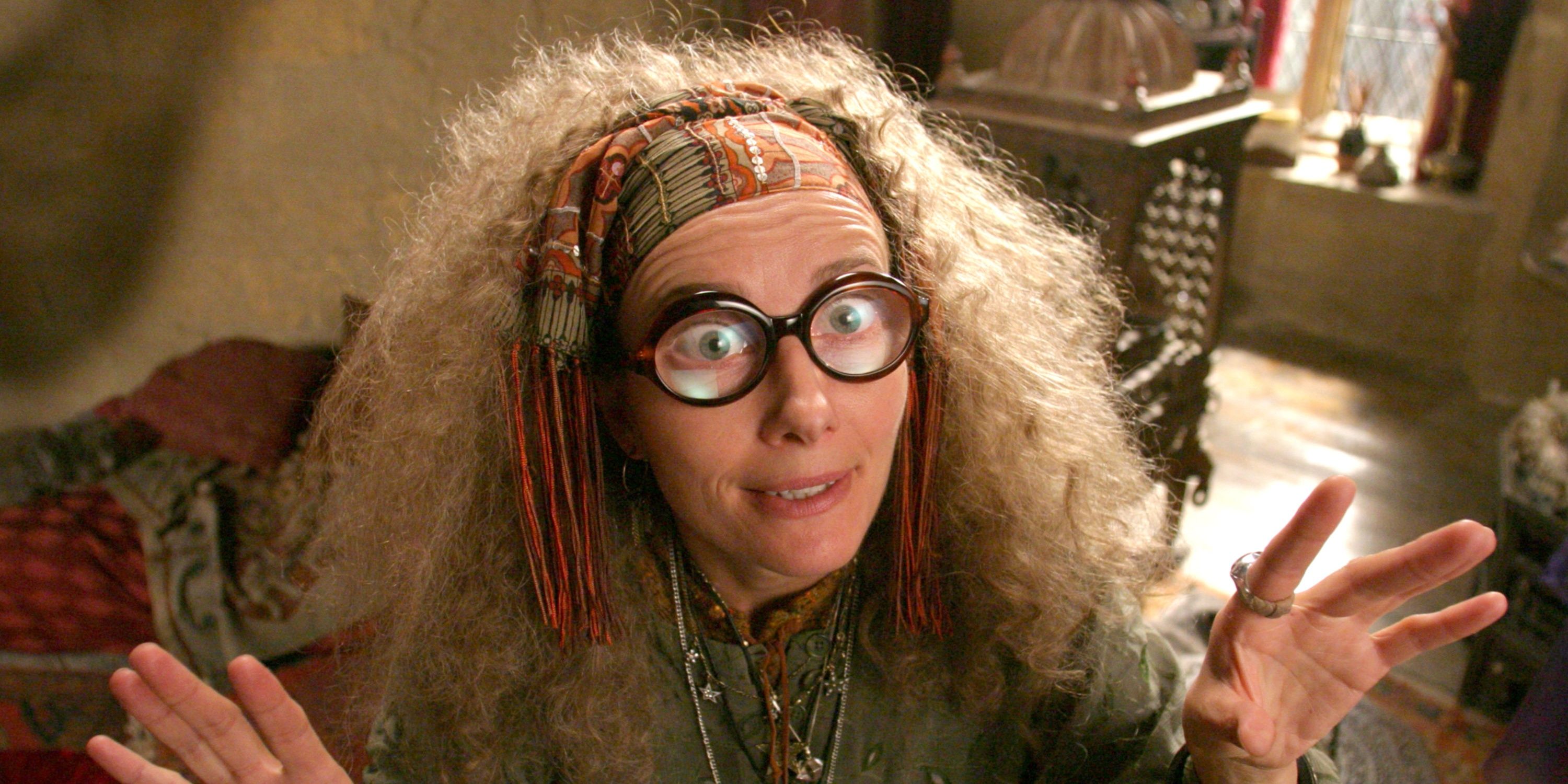 Trelawney wearing her glasses and waving her hands in Harry Potter
