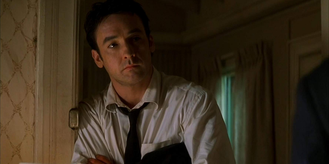 John Cusack as one of the identities in Identity