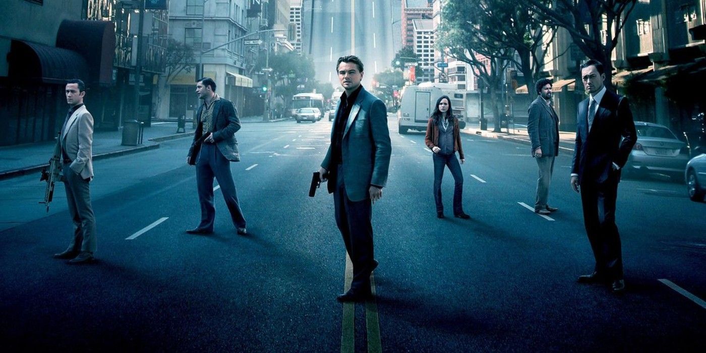 A group standing in the middle of an empty street in Inception.