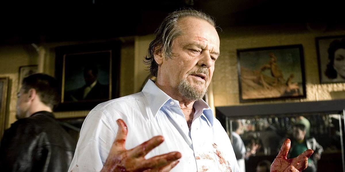 Frank Costello with bloody hands in The Departed