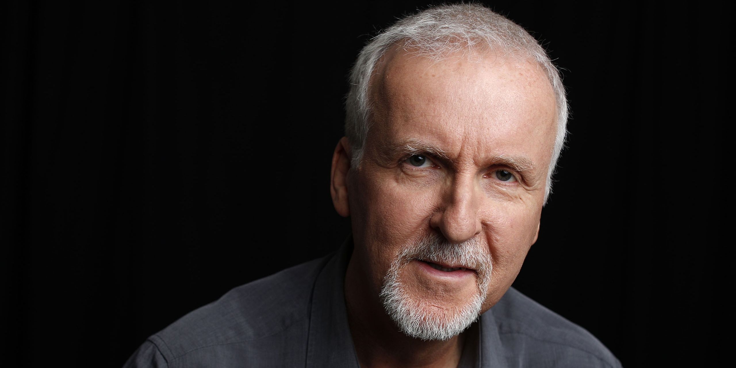 An image of James Cameron on a dark background
