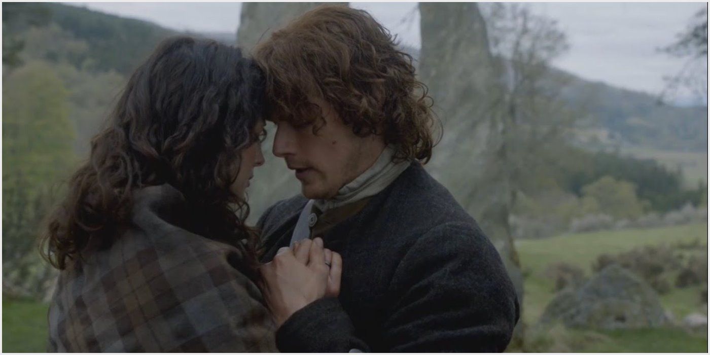 Claire and Jamie embrace at the Stones. 
