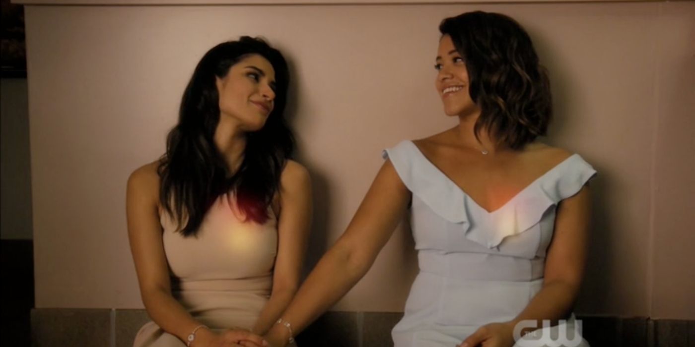 Jane and Lina sitting on the bathroom floor in Jane the Virgin