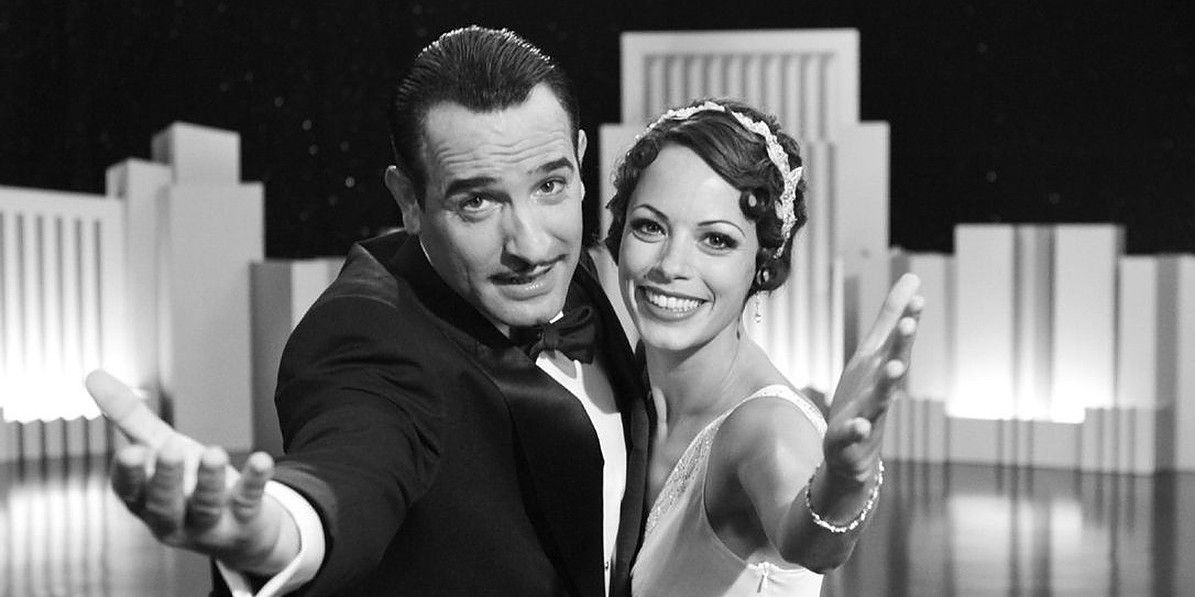 Jean-Dujardin-as-George-and-Berenice-Bejo-as-Peppy-in-The-Artist Cropped.v1