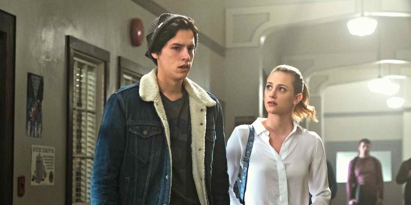 Jughead and Betty standing together in Riverdale