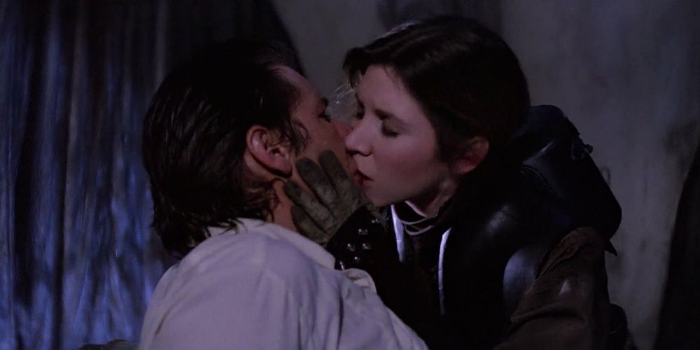 Leia saves Han from carbonite freezing and kisses him in Return Of The Jedi