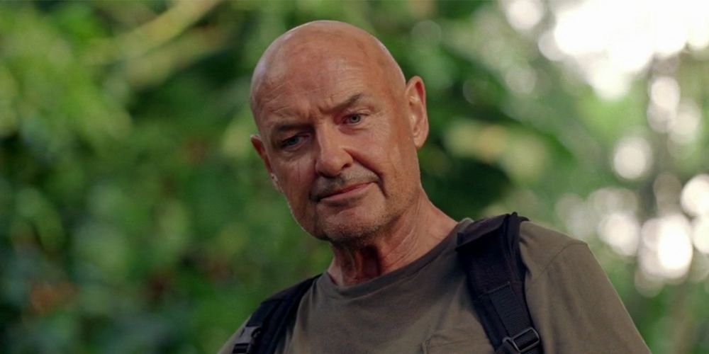 John Locke outside in the jungle on Lost