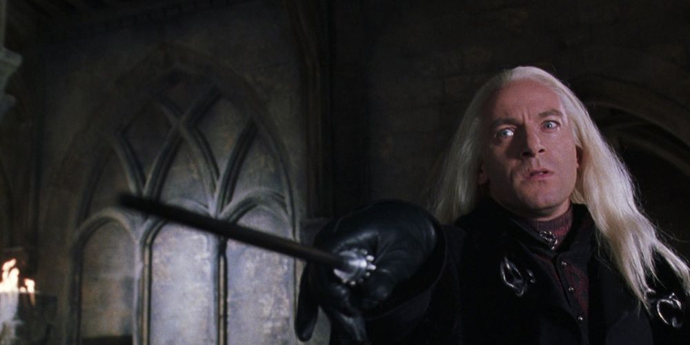 Lucius Malfoy tries to attack Harry