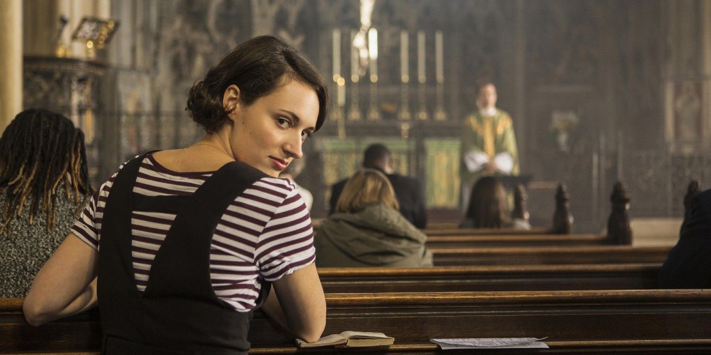 Phoebe Waller-Bridge sitting in church and looking over her shoulder in Fleabag.