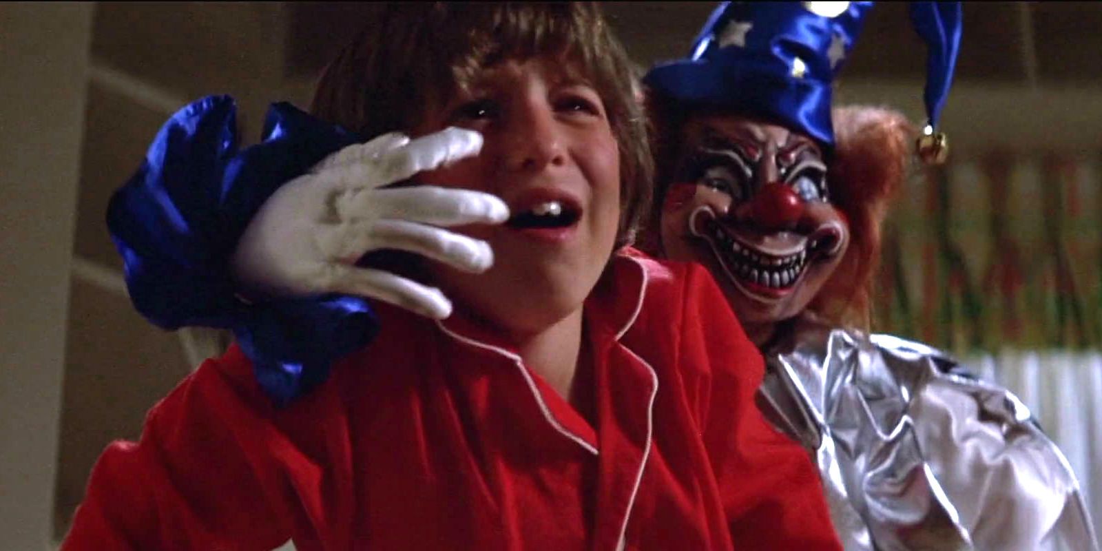 A clown holding the boy from Poltergeist.