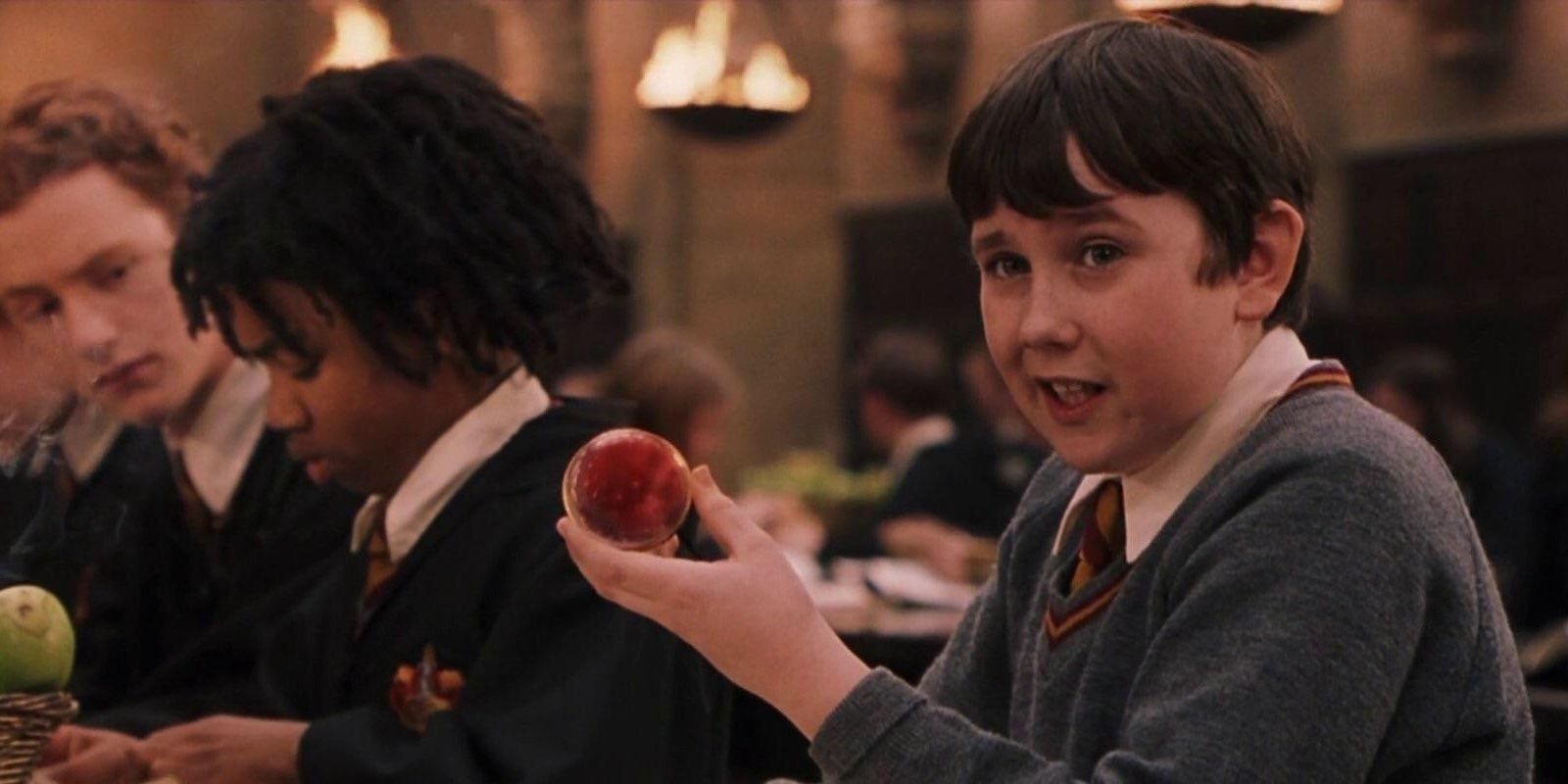 Neville holding the Remembrall in Harry Potter. 
