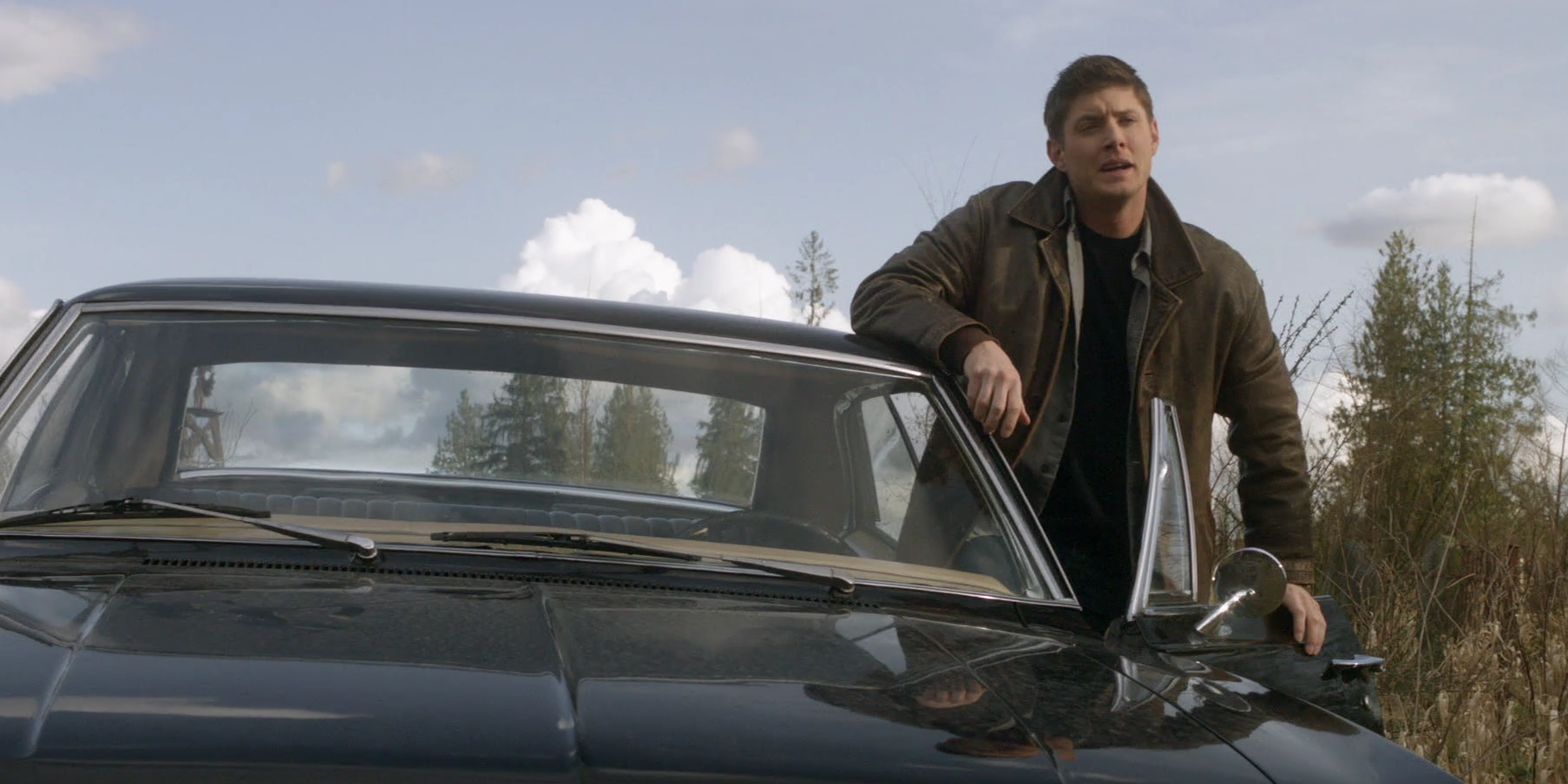Dean in his Impala car in Swan Song episode of Supernatural
