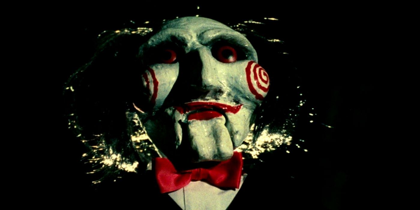 The Tragic Backstory Behind Saw’s Billy The Puppet