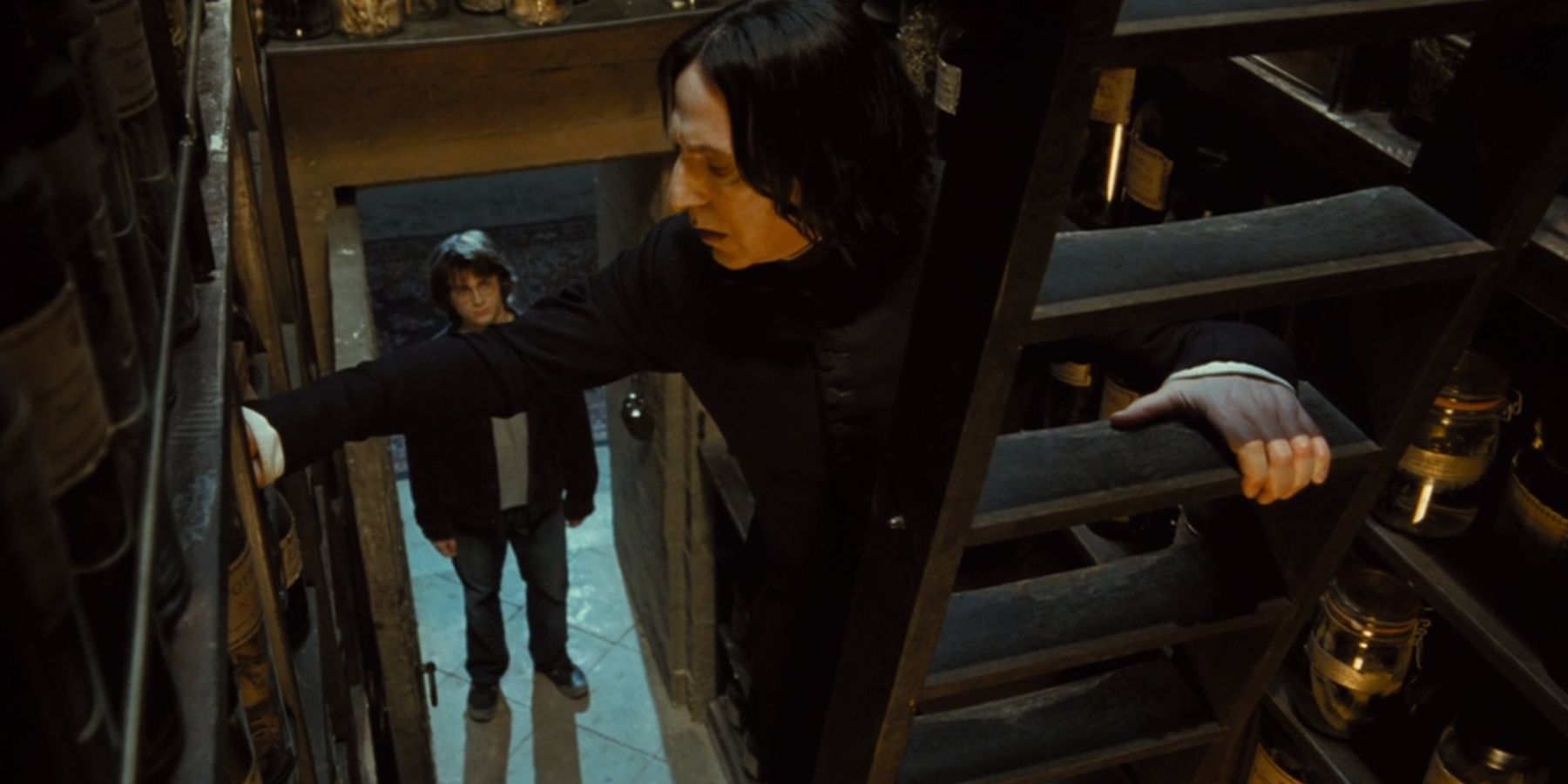 Severus Snape speaking with Harry Potter in the potions storeroom in Harry Potter And The Goblet Of Fire