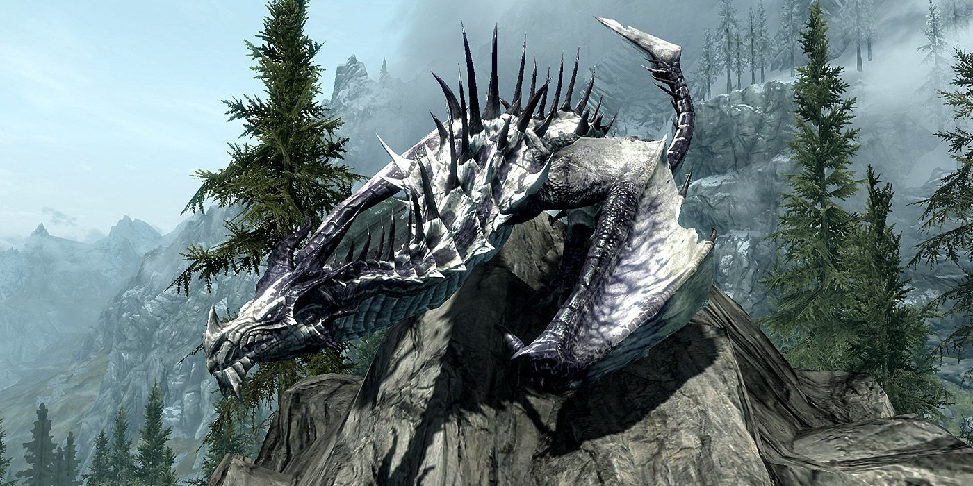 A dragon perched on a rock in Skyrim.