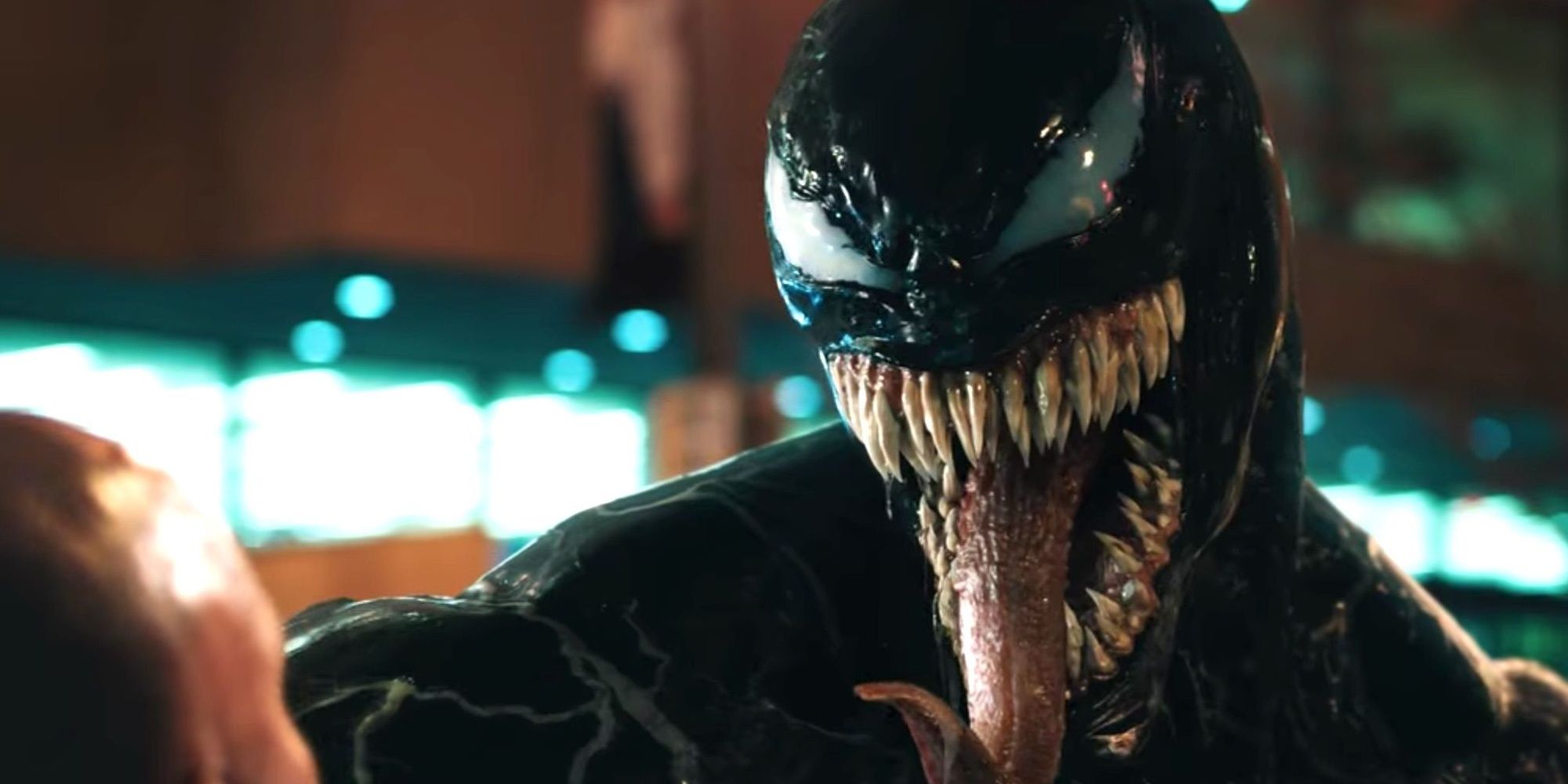 Venom about to eat someone in Venom