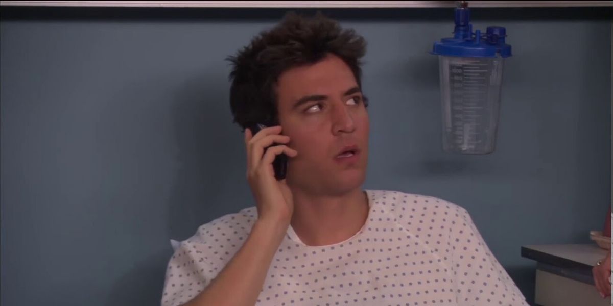 Ted on the phone in hospital