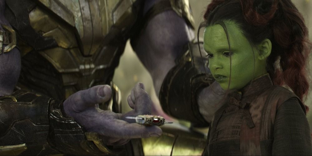 Thanos holds out a knife for young Gamora in Infinity War