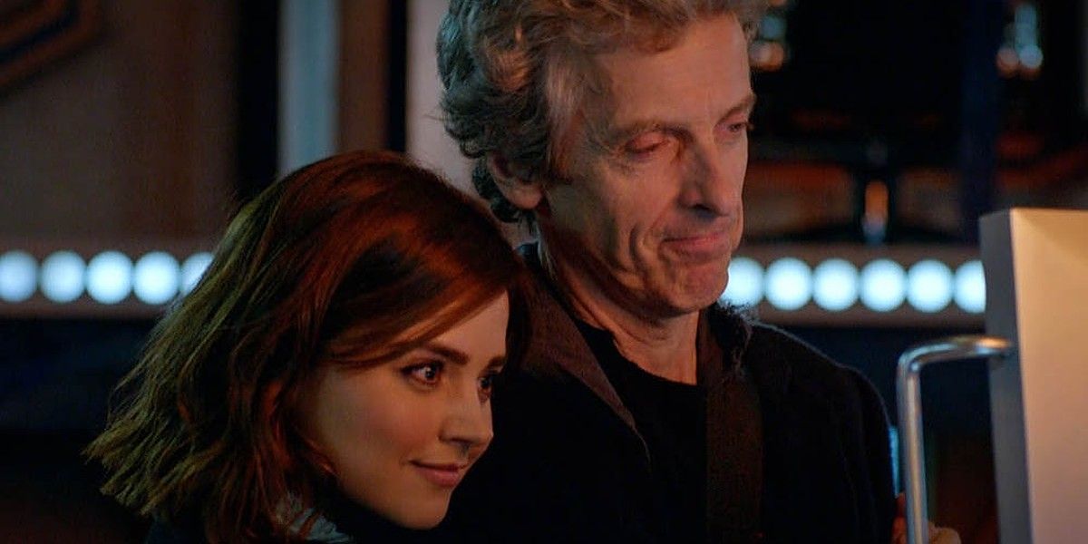 Clara resting her head on the Twelfth Doctor's shoulder in Doctor Who.