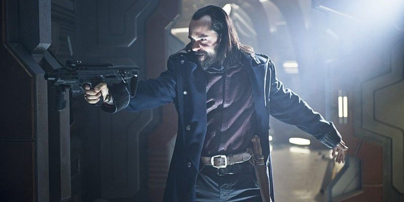 Vandal Savage holds a gun on Legends of Tomorrow