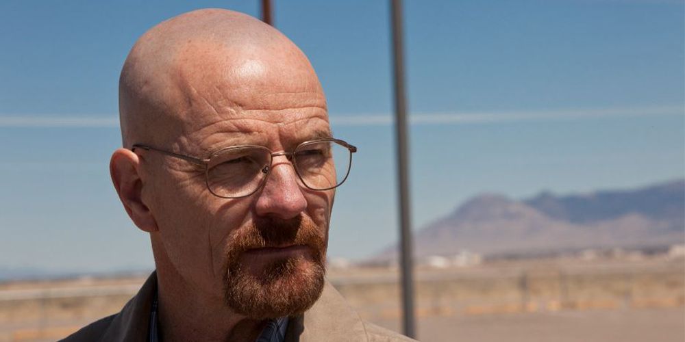 Walter White from Breaking Bad staring off into distance in the desert