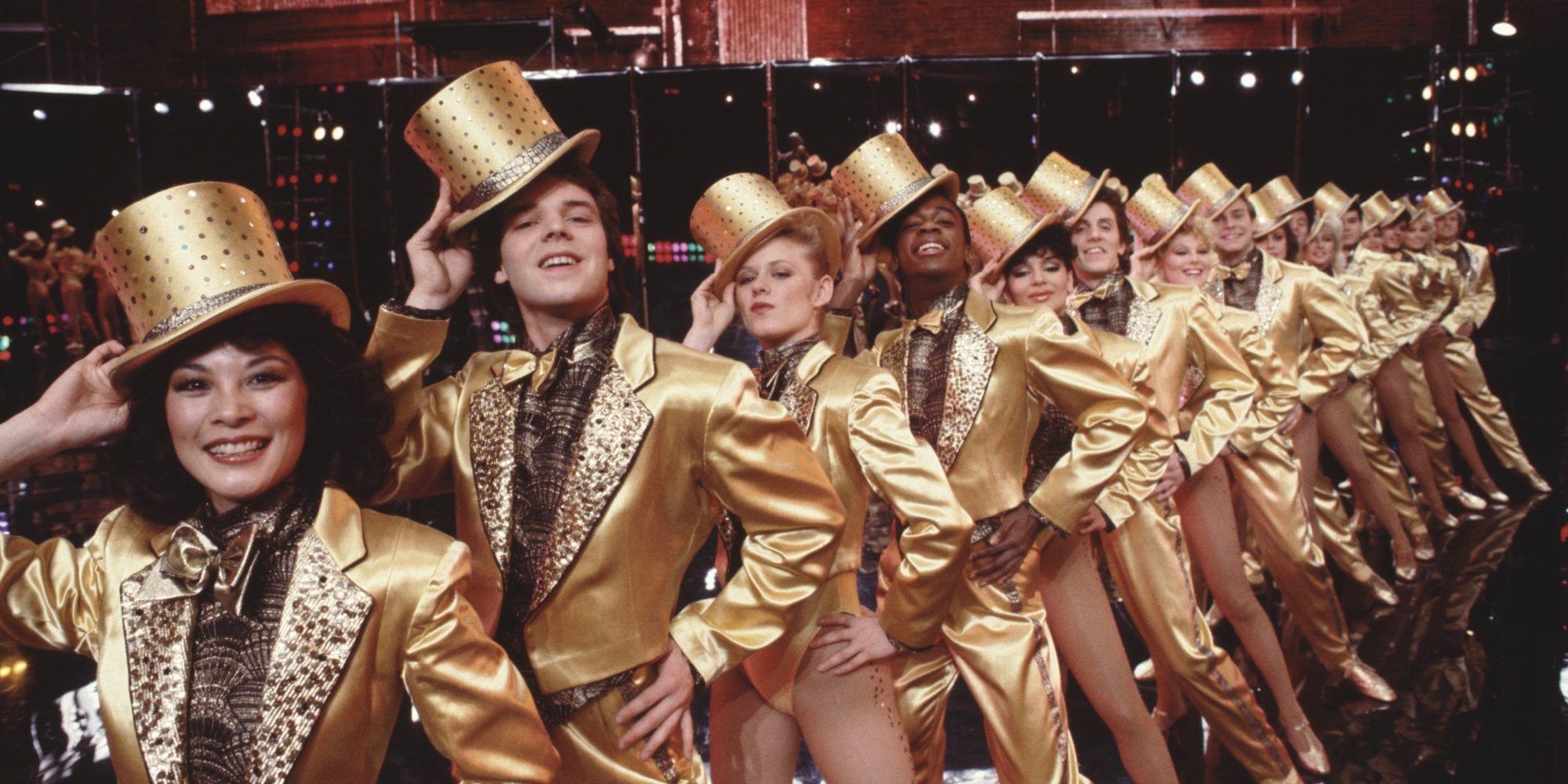 The chorus line wearing all gold in A Chorus Line