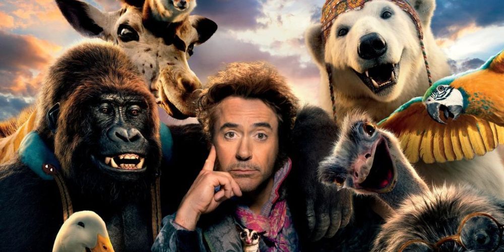 A poster of Robert Downey, Jr. alongside the animals of Dolittle.
