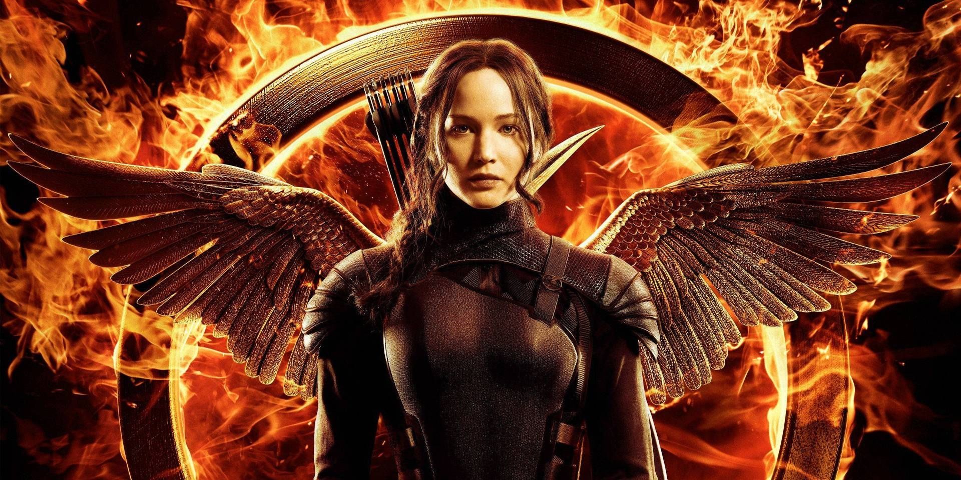 Jennifer Lawrence as Katniss Everdeen in The Hunger Games with fiery background