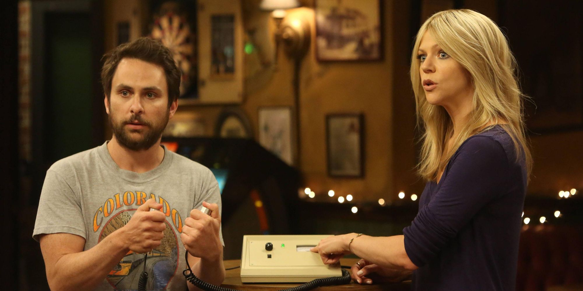 Dee and Charlie looking at someone in It's Always Sunny in Philadelphia