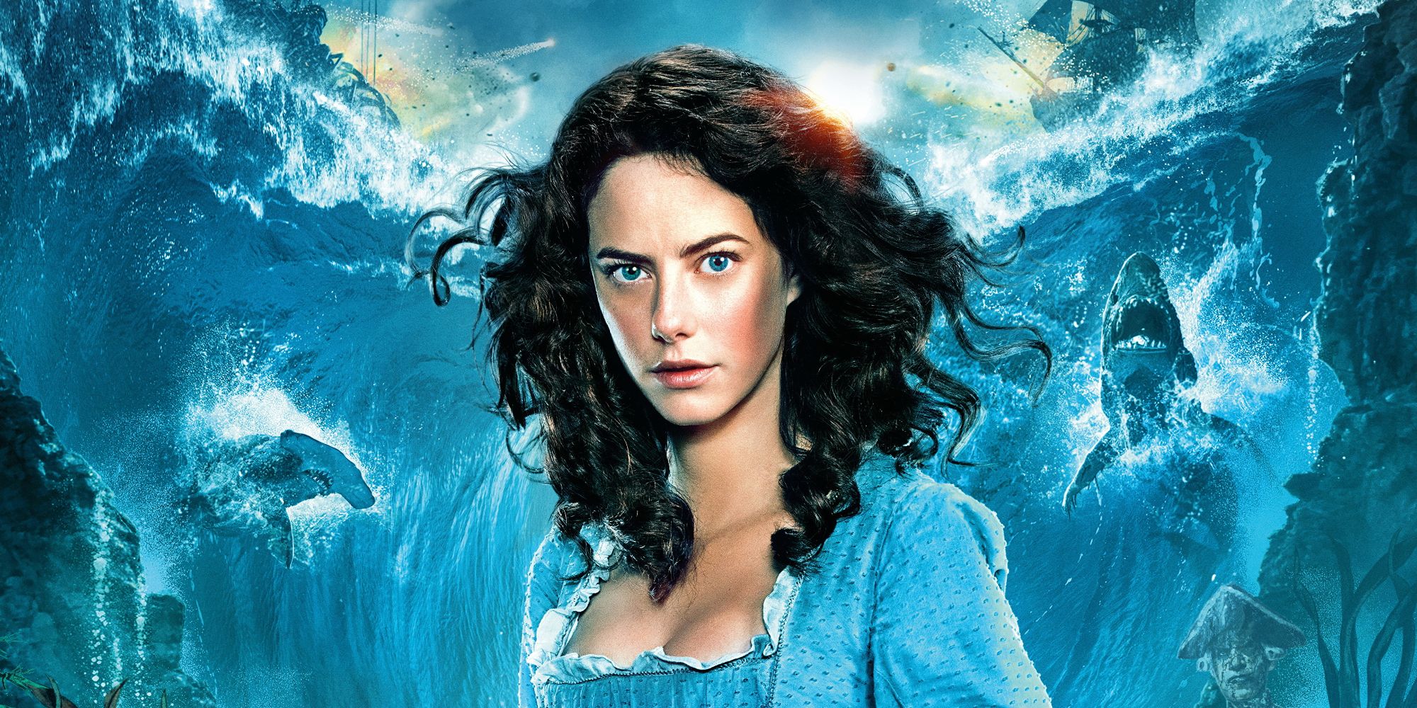 Kaya Scodelario in front of an ocean backdrop in a poster for Pirates of the Caribbean 5.