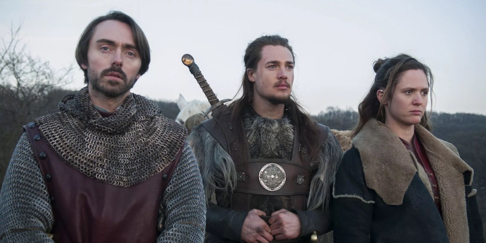 King Alfred next to Uhtred and Brida in The Last Kingdom.