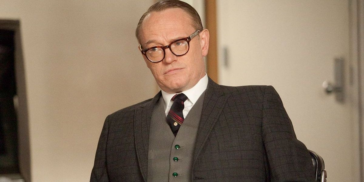 Lane Pryce in the conference room in Mad Men
