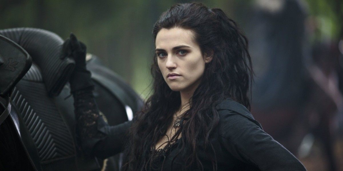 An image of Morgana standing next to a horse in Merlin