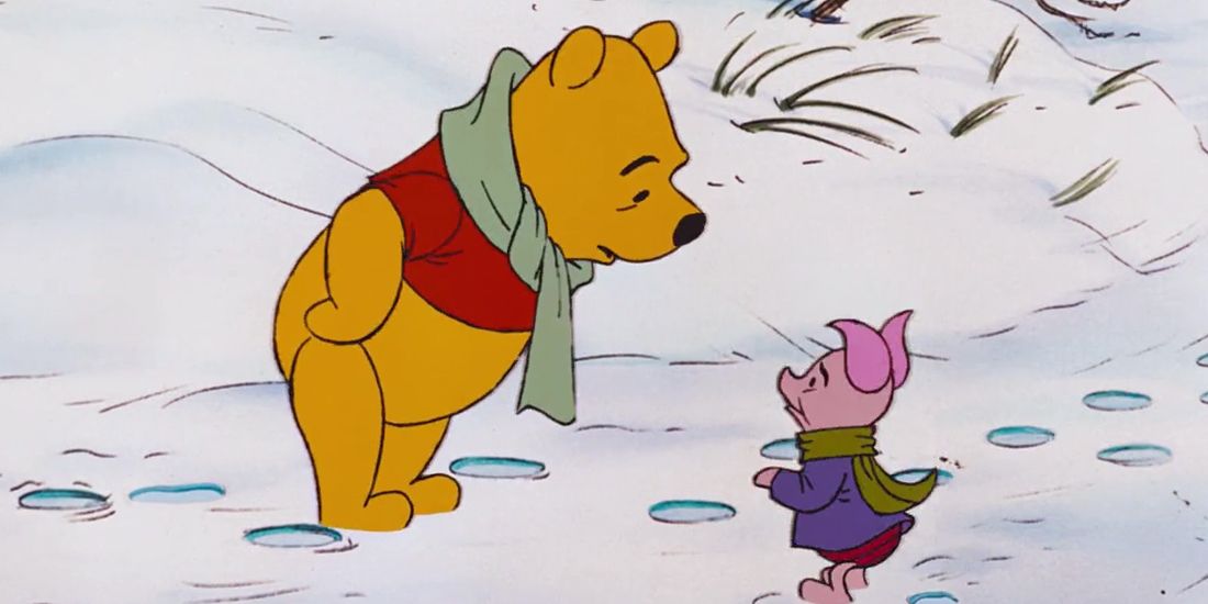 Pooh and Piglet walking in a snowy wood