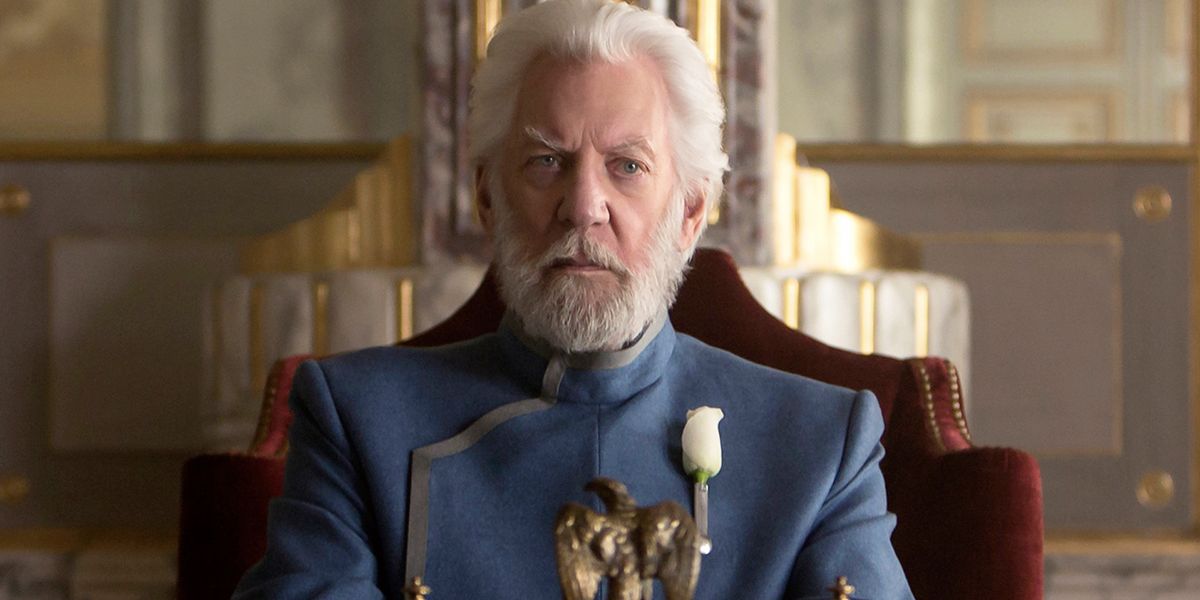 President Snow sits in his gilded office in the Hunger Games franchise