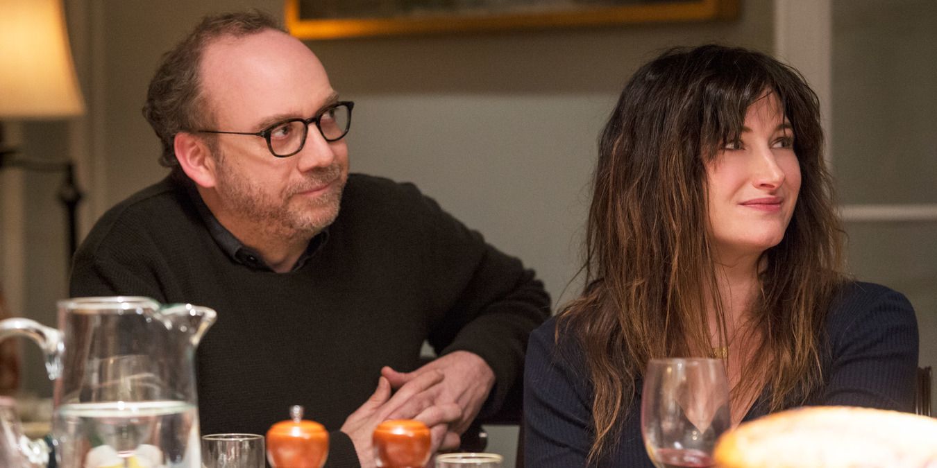 Rachel and Richard sit at a dinner table