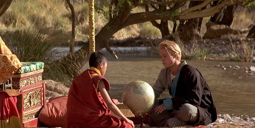 Brad Pitt sitting with a monk in Seven Years In Tibet