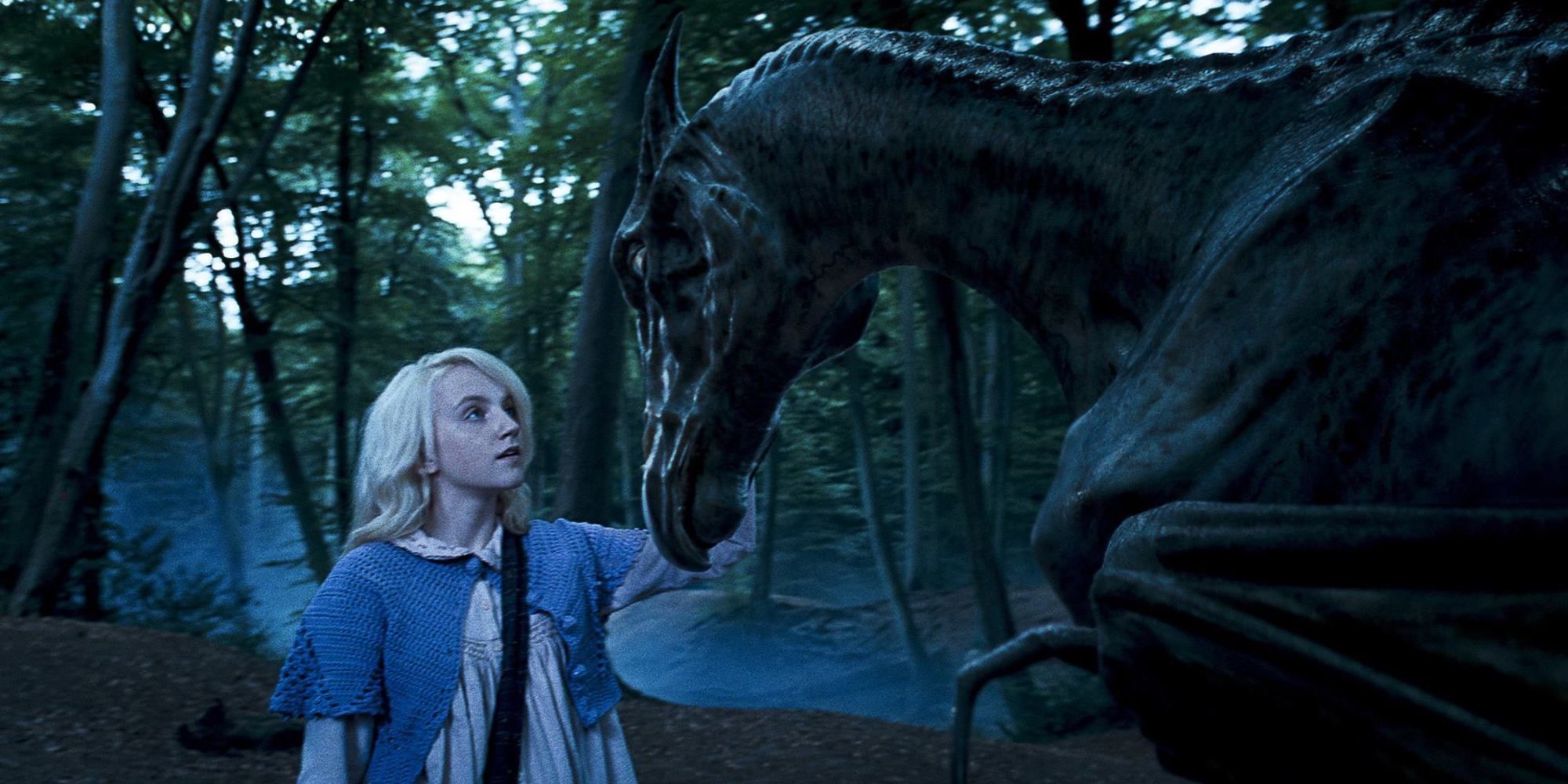 An image of Luna stroking a Thestral in Harry Potter