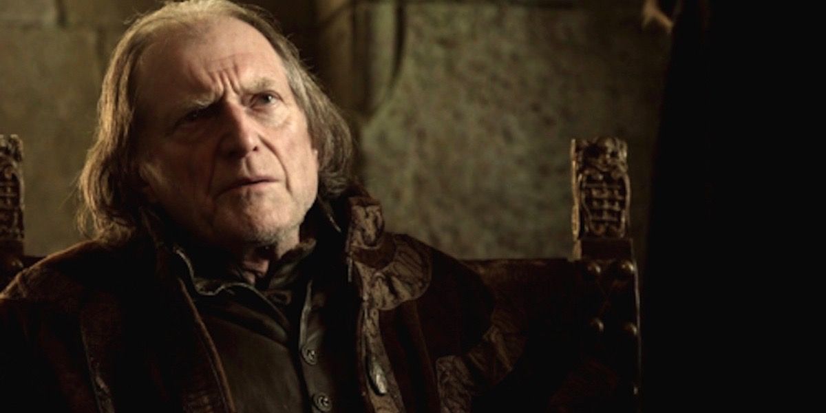 Walder Frey at his dinner table in Game of Thrones.