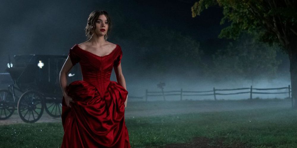 Emily in a red dress and fog