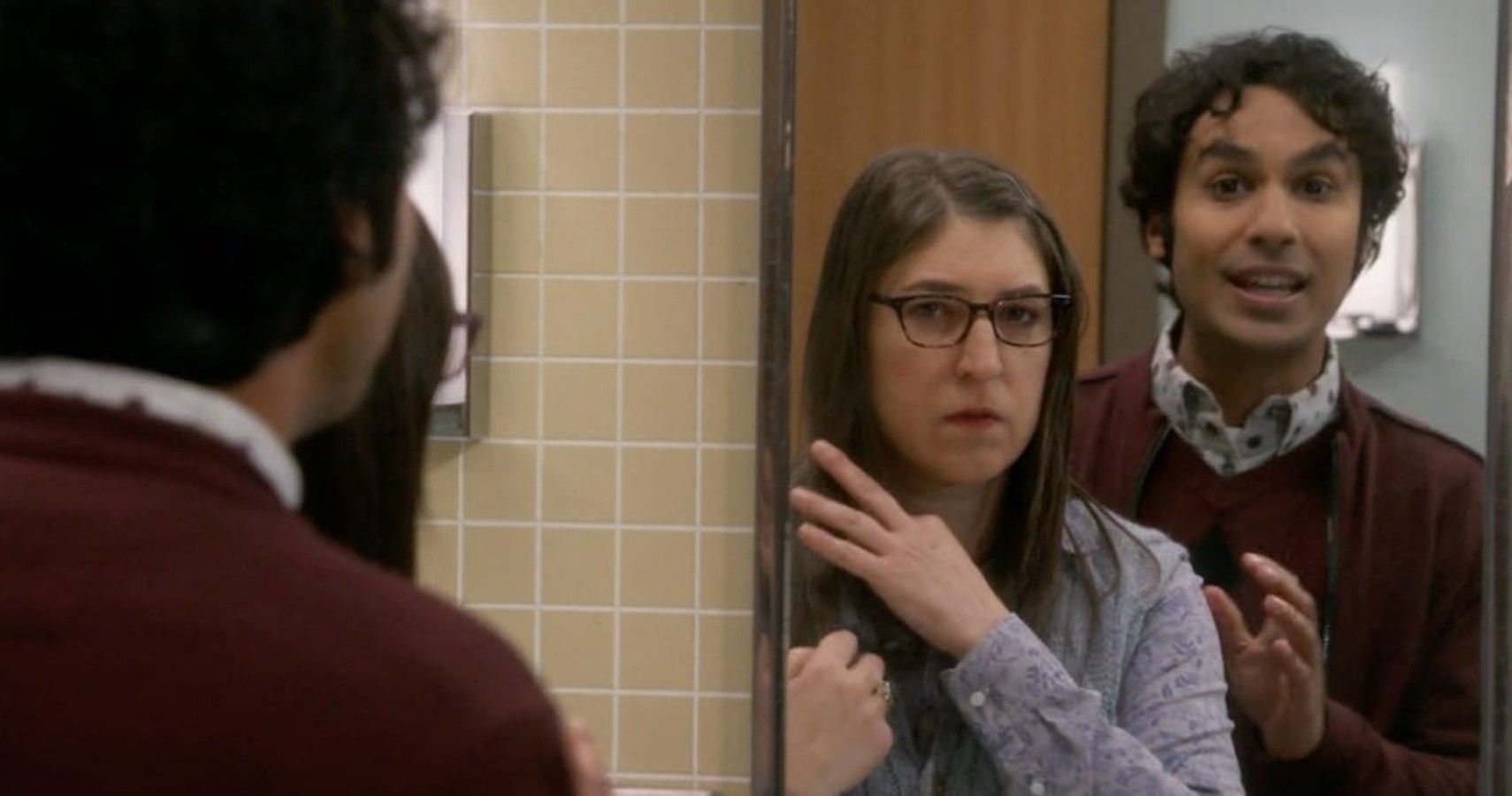 Amy and Raj look in the mirror for a makeover on TBBT