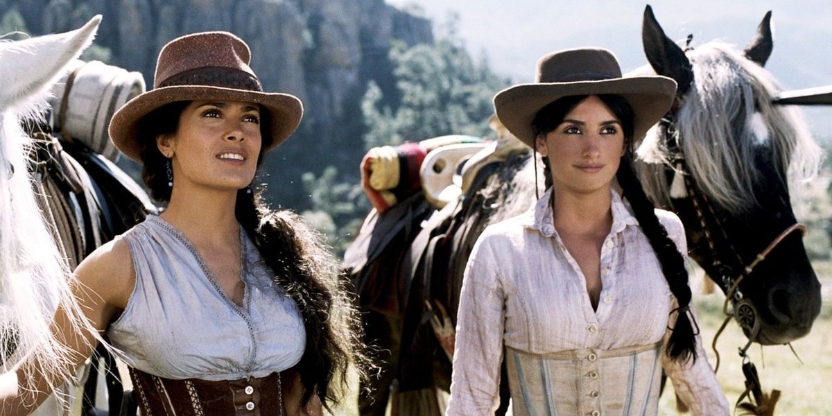 Salma Hayek and Penelope Cruz lead their horses in Bandidas