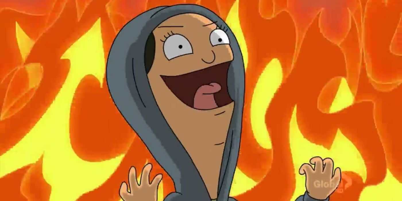 Louise Belcher smiling while fire burns in the background in Bob's Burgers