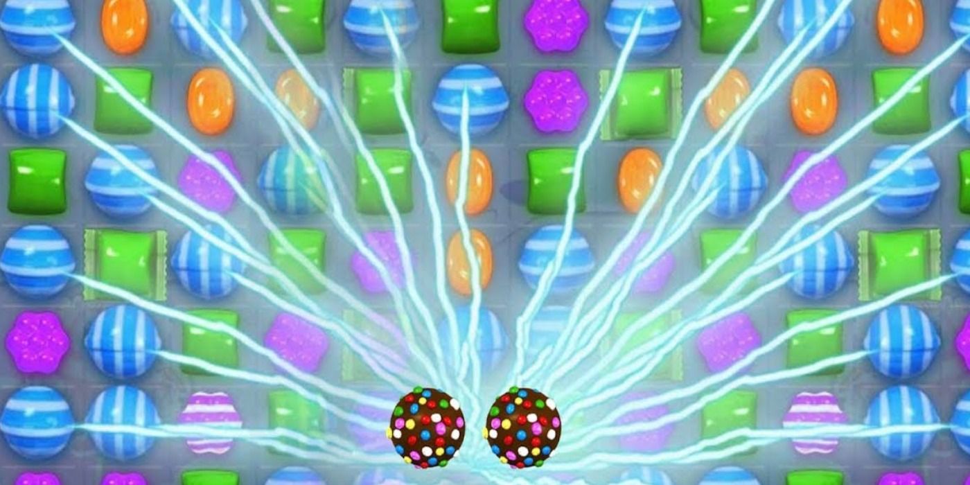 An image of Candy Crush Saga gameplay showing lighting shooting from a special move. 